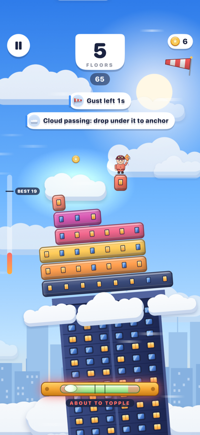 Gameplay with a glowing anchor cloud near the top of the tower